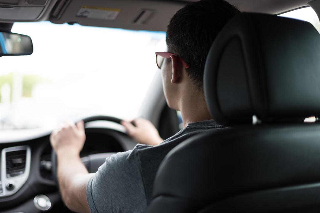 man-driving-car-during-daytime-zam1sdicgxc